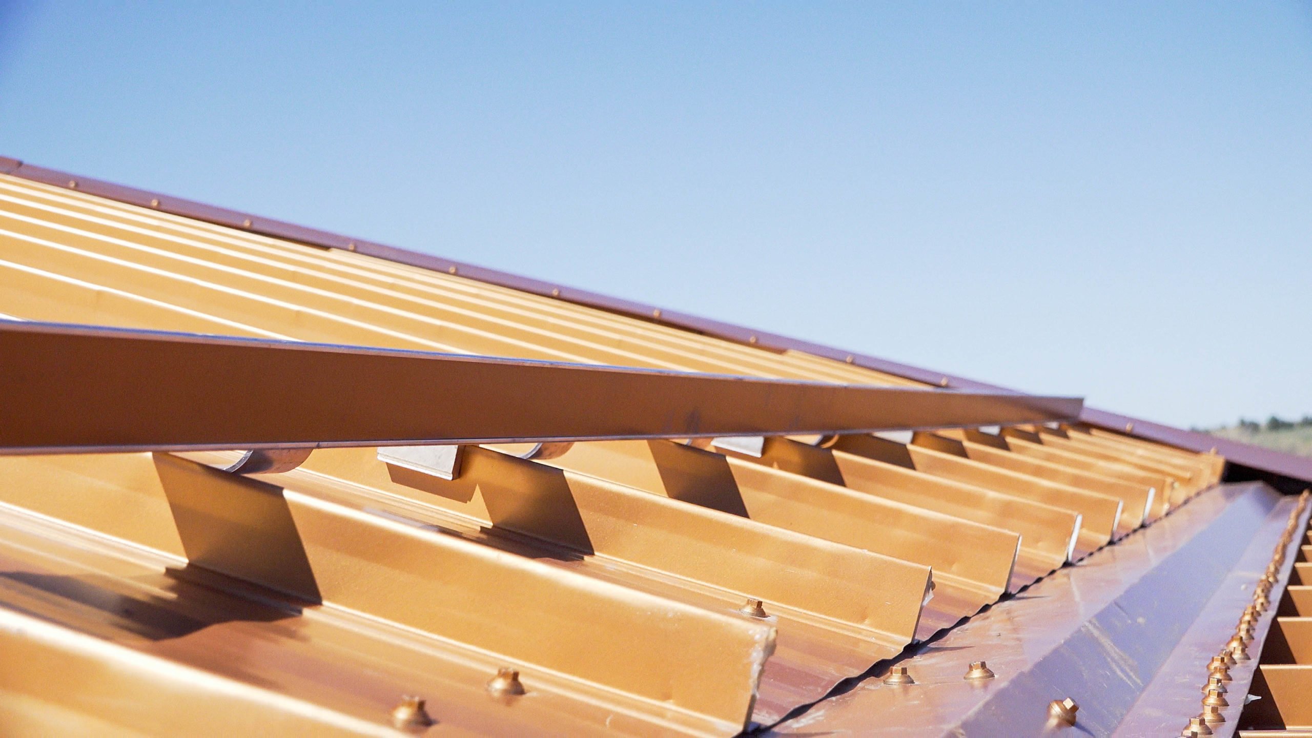 S-5! Colorgard snow retention system is mounted on a metal roof